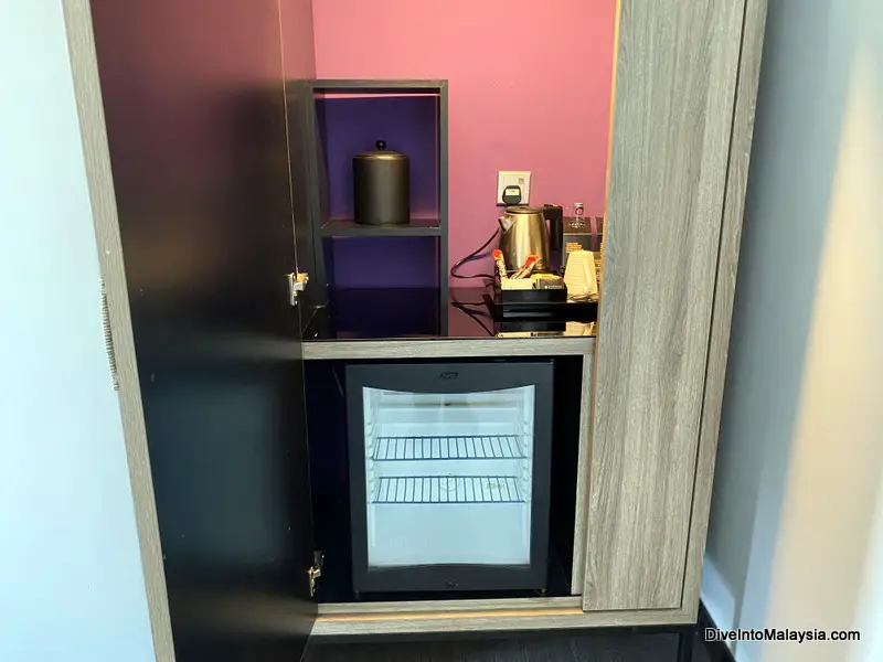 Pullman Miri Waterfront deluxe room Tea and coffee making facilities and (not working) minifridge